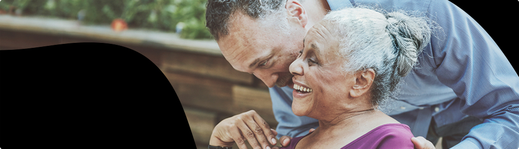Image of an elderly couple laughing
